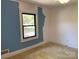 Bedroom featuring a standard window at 209 8Th Nw Ave, Hickory, NC 28601