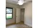 Bedroom with a window and a closet with an open door allows for easy storage at 209 8Th Nw Ave, Hickory, NC 28601