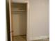 A bedroom closet with a simple shelf and hanging rod offers convenient storage at 209 8Th Nw Ave, Hickory, NC 28601