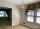Bright dining area featuring a chandelier at 209 8Th Nw Ave, Hickory, NC 28601