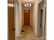 Hallway with 3 doors and overhead lighting at 209 8Th Nw Ave, Hickory, NC 28601