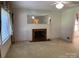 Classic living room features fireplace and large windows at 209 8Th Nw Ave, Hickory, NC 28601