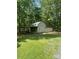 Exterior view of the barn featuring double doors and storage at 2120 Marwood Ln, Albemarle, NC 28001