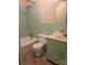 Bathroom features tile walls, green vanity, and tile flooring at 2120 Marwood Ln, Albemarle, NC 28001