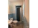A classic bathroom featuring blue tiled walls, a shower, and vintage fixtures at 2120 Marwood Ln, Albemarle, NC 28001