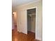 Bedroom closet featuring sliding doors and a shelf for optimal storage at 2120 Marwood Ln, Albemarle, NC 28001