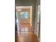 Dining room with hardwood floors and sunny window at 2120 Marwood Ln, Albemarle, NC 28001