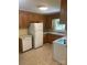 Well-lit kitchen featuring vintage wooden cabinetry, appliances and a functional layout at 2120 Marwood Ln, Albemarle, NC 28001