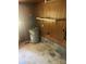 Basement with water heater, storage shelf, and utility hookups at 2120 Marwood Ln, Albemarle, NC 28001
