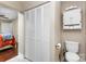 Bathroom featuring closet, toilet and bedroom access at 21322 Mccall St, Cornelius, NC 28031
