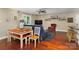 Open concept floor plan with dining area and kitchen island seating at 21322 Mccall St, Cornelius, NC 28031