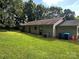 Spacious backyard with well-maintained lawn and a view of the home's exterior at 227 James Rd, Taylorsville, NC 28681