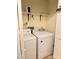 Bright laundry area with washer, dryer and storage shelf space above at 227 James Rd, Taylorsville, NC 28681