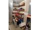 Unfinished basement storage room with wooden shelving and ample space at 227 James Rd, Taylorsville, NC 28681