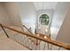 Grand foyer with hardwood floors, chandelier, and a large window providing natural light at 2317 Houston Branch Rd, Charlotte, NC 28270