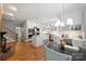 Spacious kitchen with white cabinetry, a center island, stainless steel appliances, and a breakfast nook at 2317 Houston Branch Rd, Charlotte, NC 28270