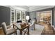 Well-lit office featuring a desk, chair, and bay window with views of the outdoors at 2317 Houston Branch Rd, Charlotte, NC 28270