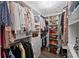 Spacious walk-in closet with custom shelving, drawers, and ample storage space at 2317 Houston Branch Rd, Charlotte, NC 28270