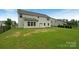 Backyard with a patio and black fence at 2382 Drake Mill Sw Ln, Concord, NC 28025