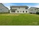 Backyard with a patio and black fence at 2382 Drake Mill Sw Ln, Concord, NC 28025