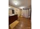 Clean and bright bathroom with a large vanity, full tub/shower with curtain, and ample space at 2418 6Th Sw Ave, Hickory, NC 28602