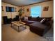Cozy living room featuring comfortable seating, a large window and modern decor at 2418 6Th Sw Ave, Hickory, NC 28602