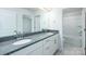 Well-lit bathroom featuring double sinks with granite countertops and a separate toilet room at 259 Miramar Dr, York, SC 29745