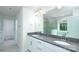 Bright bathroom featuring double sinks with granite countertops and a glass-enclosed shower at 259 Miramar Dr, York, SC 29745