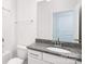 Bathroom featuring a granite-topped vanity and a shower-tub combination at 259 Miramar Dr, York, SC 29745