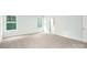 Bright bedroom with neutral carpet and plenty of natural light from two windows at 259 Miramar Dr, York, SC 29745
