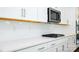 Modern kitchen with stainless steel appliances, including gas range, white backsplash and cabinets at 259 Miramar Dr, York, SC 29745