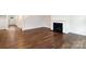 Spacious living room with a fireplace, hardwood floors and an open floorplan with views of the front door at 259 Miramar Dr, York, SC 29745