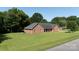 Expansive lawn surrounds this brick home, offering a serene and private setting at 2765 Dogwood Cir, Rock Hill, SC 29732