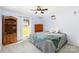 Charming bedroom features a well-lit window, carpet flooring, a ceiling fan and hardwood bookshelf at 2765 Dogwood Cir, Rock Hill, SC 29732