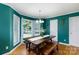 Charming dining room with hardwood floors, ample lighting and green walls at 2765 Dogwood Cir, Rock Hill, SC 29732