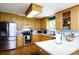 Efficient kitchen layout with stainless appliances, lots of light and hardwood floors at 2765 Dogwood Cir, Rock Hill, SC 29732