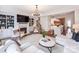 Open-concept living room featuring a fireplace, built-in shelving, and access to the kitchen at 3036 Luke Crossing Dr, Charlotte, NC 28226
