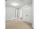 Spacious bedroom with neutral carpet and white trim offers a blank canvas to create your own oasis at 334 Ladybird Ln, Pineville, NC 28134