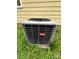 Outdoor HVAC unit with the Bryant logo, surrounded by grass and foliage at 3396 Farm Lake Sw Dr, Concord, NC 28027