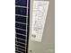 Close-up of the HVAC unit with detailed specification and certification labels visible at 3396 Farm Lake Sw Dr, Concord, NC 28027
