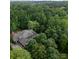 Secluded home surrounded by lush greenery, offering privacy and tranquility at 408 Covington Xing, Matthews, NC 28104