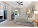 Comfortable bedroom with plush carpet, soft color palette, and ample closet space creates a relaxing retreat at 408 Covington Xing, Matthews, NC 28104