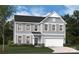 Charming two-story home featuring a classic design, a two-car garage, and well-manicured lawn at 4125 Vista Pine Dr, Charlotte, NC 28215