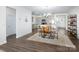 Open concept dining room with stainless steel appliances and views of the kitchen and living spaces at 4177 Steel Way, Sherrills Ford, NC 28673