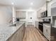 Modern kitchen featuring granite countertops, stainless steel appliances, and an open layout at 4177 Steel Way, Sherrills Ford, NC 28673