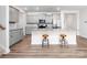 Modern kitchen featuring gray cabinets, granite countertops, a kitchen island, and stainless steel appliances at 4177 Steel Way, Sherrills Ford, NC 28673
