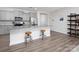 Modern kitchen featuring gray cabinets, granite countertops, a kitchen island, and stainless steel appliances at 4177 Steel Way, Sherrills Ford, NC 28673