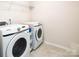 Convenient laundry room equipped with modern Samsung washer and dryer units at 4177 Steel Way, Sherrills Ford, NC 28673