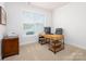 Bright office space with a large window and a modern desk, perfect for remote work at 4177 Steel Way, Sherrills Ford, NC 28673