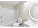 Bright bathroom with a shower-tub combo, white vanity, and modern fixtures at 429 Merry Go Dr, York, SC 29745